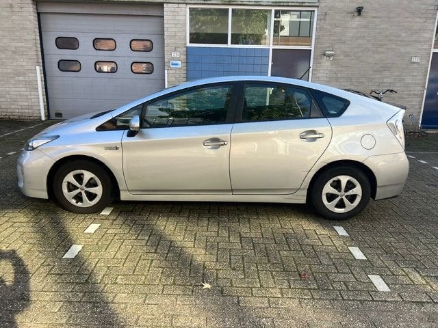 Toyota Prius 1.8 Plug-in Hybrid 136PK Aut 2013 Grijs, Auto's, 75 €/maand, Prius, Te koop, 1400 kg