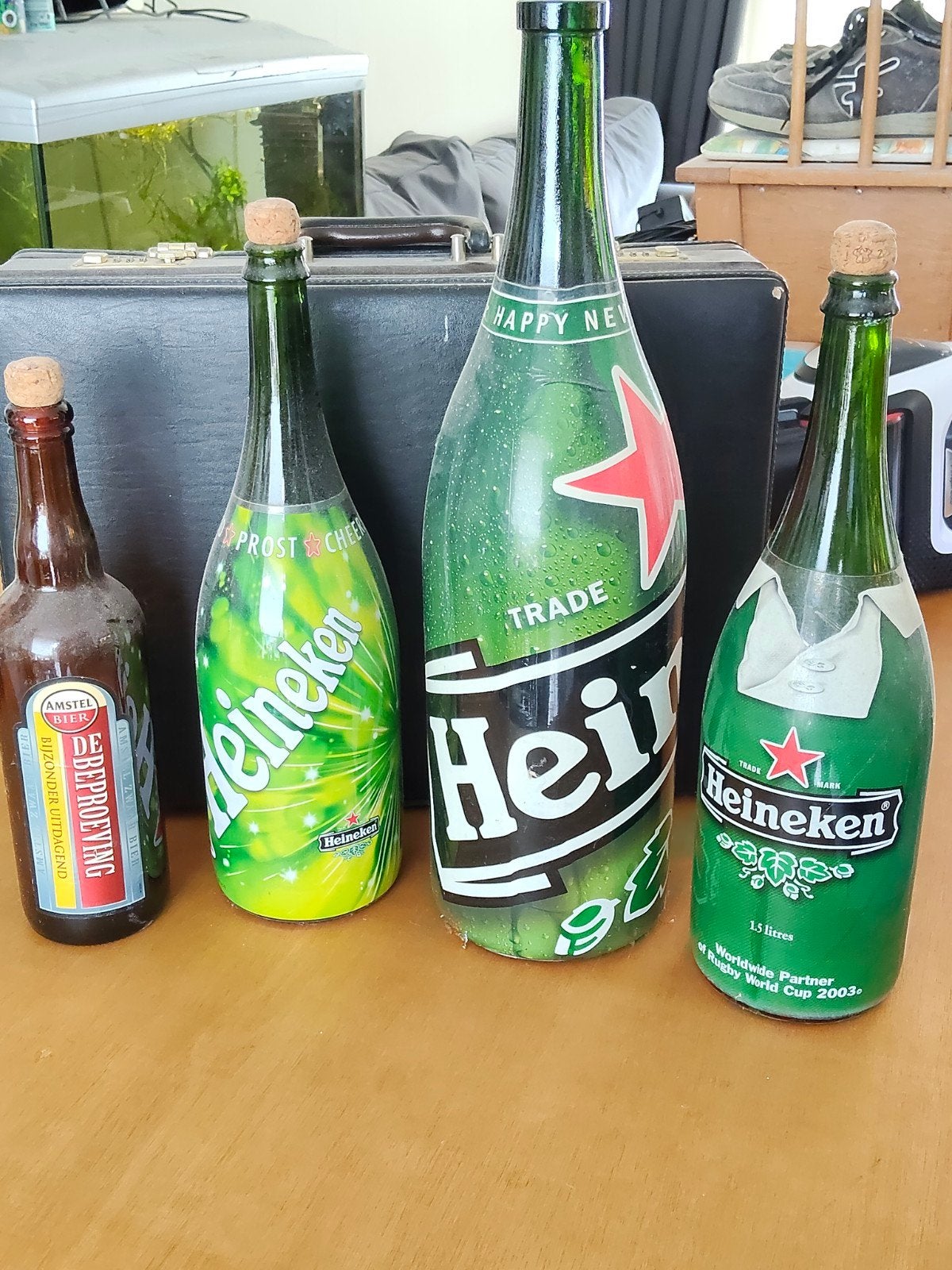 Verzameling Heineken en Amstel bierflessen (decoratie), Ophalen of Verzenden, Gebruikt