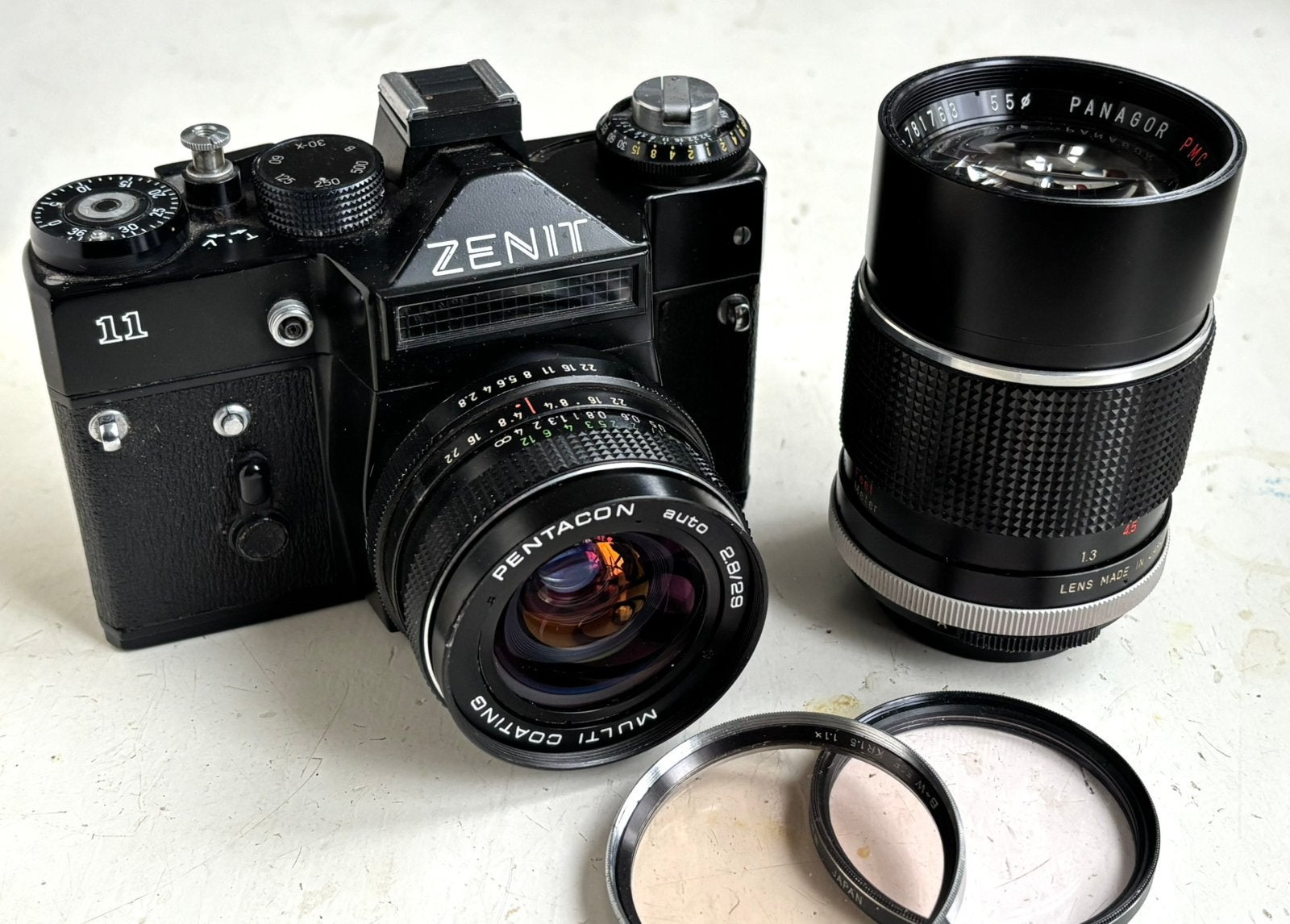 Zenit 11 met Pentacon 28mm en Panagor 135mm, Ophalen of Verzenden, Gebruikt, Spiegelreflex, Overige Merken