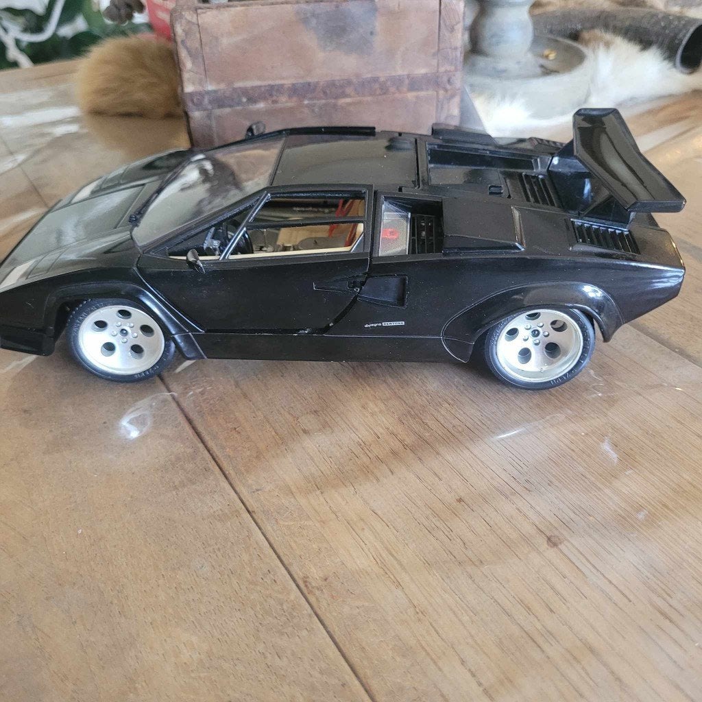 Bburago Lamborghini Countach 1988, 50000, quattrovalvole, Ophalen of Verzenden, Zo goed als nieuw, Auto, Bburago