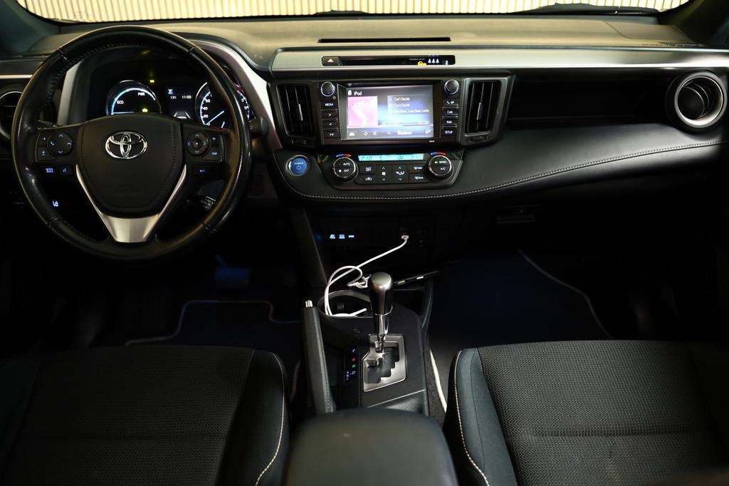 Toyota RAV4 2.5 Hybrid 2WD Dynamic AUTOM CRUISE NAVI BT CLIM, Auto's, Toyota, Stof, Gebruikt, Zwart, Blauw