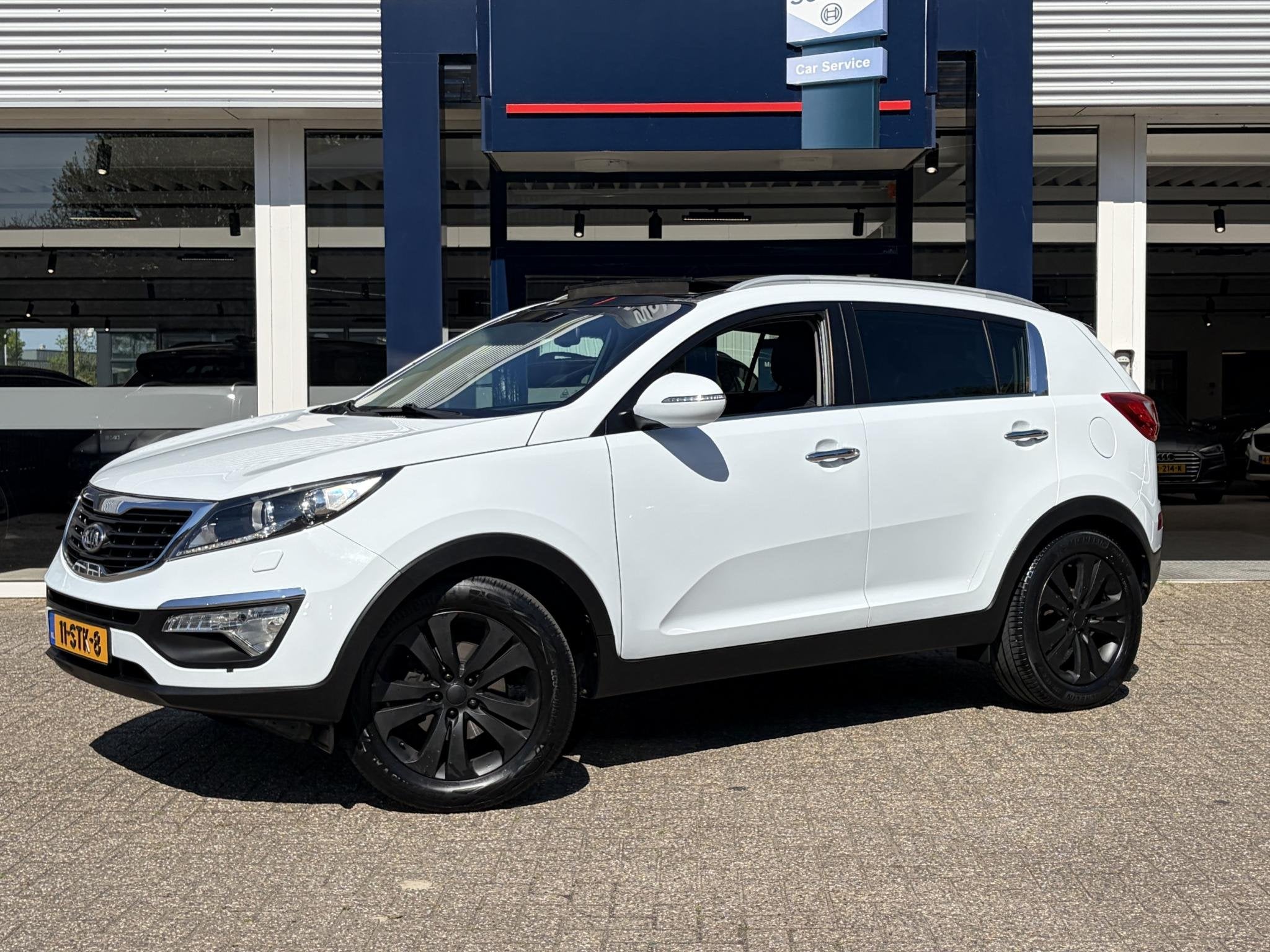 Kia Sportage 2.0 X-clusive / Automaat / NL-Auto / Vol-Leder, Auto's, Gebruikt, 4 cilinders, 1600 kg, 736 kg