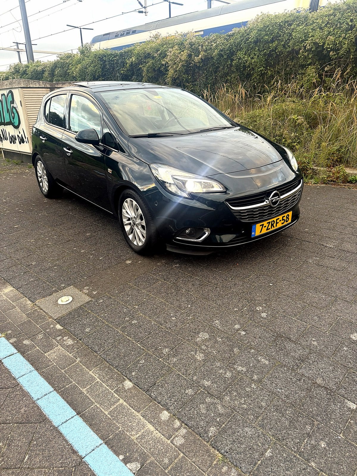 Opel Corsa 1.0T 66KW/90PK 5D 2015 Groen, Auto's, Voorwielaandrijving, Origineel Nederlands, 1200 kg, Handgeschakeld