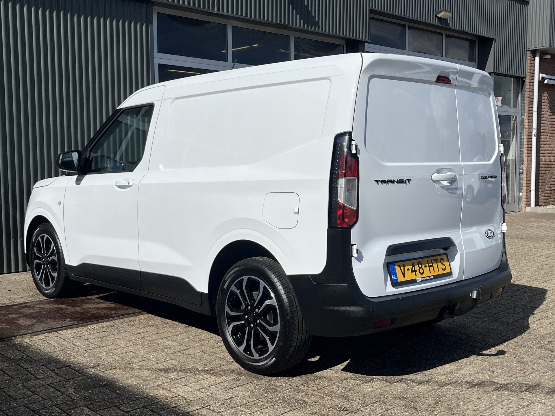 Ford Transit Courier 1.0 EcoBoost Limited Benzine Automaat A, Auto's, Gebruikt, Multifunctioneel stuurwiel, Wit, Bedrijf