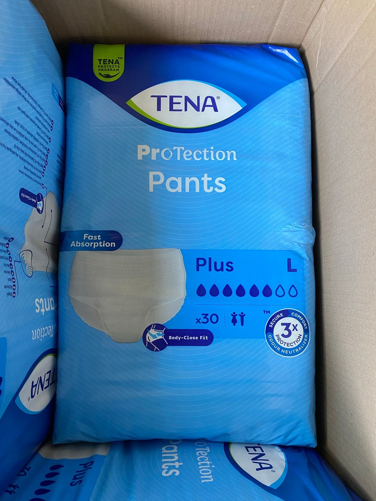 Tena Pants maat L en 6  druppels, 30 per pak, Ophalen of Verzenden