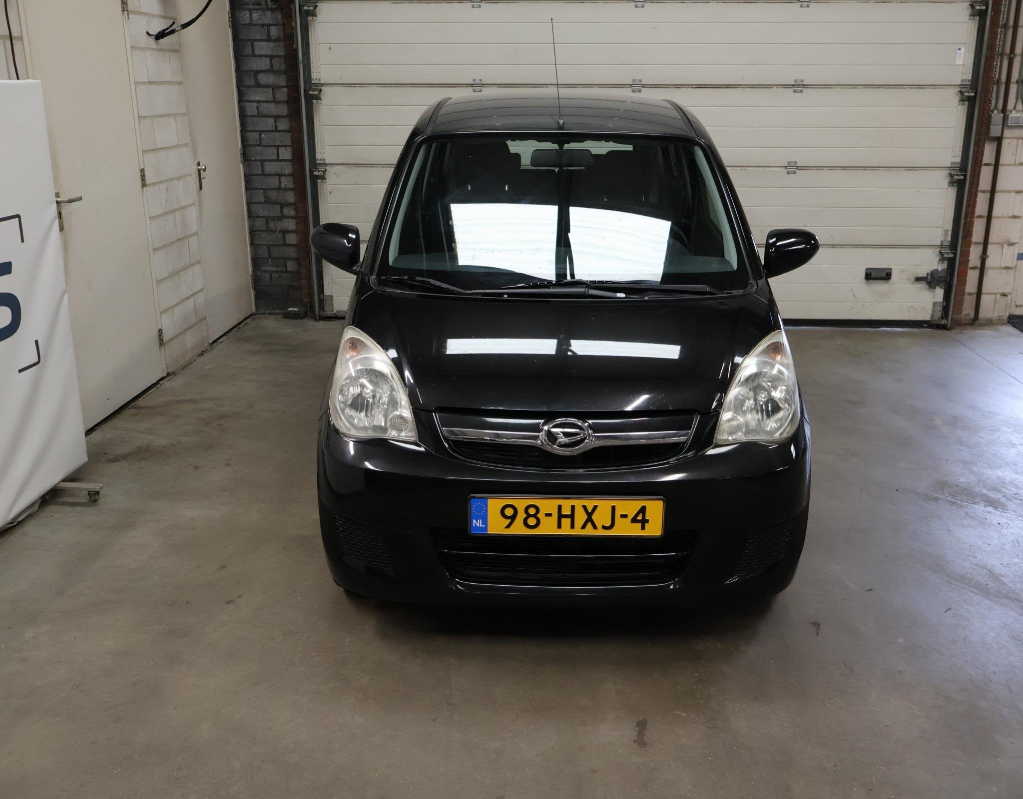 Daihatsu Cuore 1.0 Premium 2e eigenaar NAP Airco APK, Auto's, Daihatsu, Voorwielaandrijving, Stof, 4 stoelen, Cuore