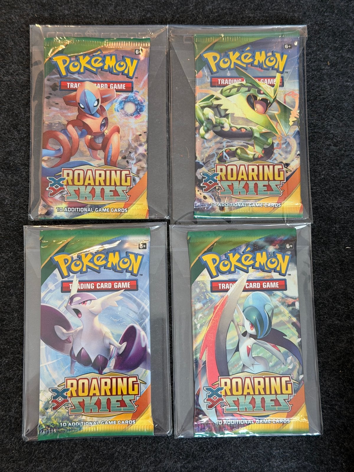 Art set sealed roaring skies booster packs Pokemon, Ophalen of Verzenden, Zo goed als nieuw, Booster