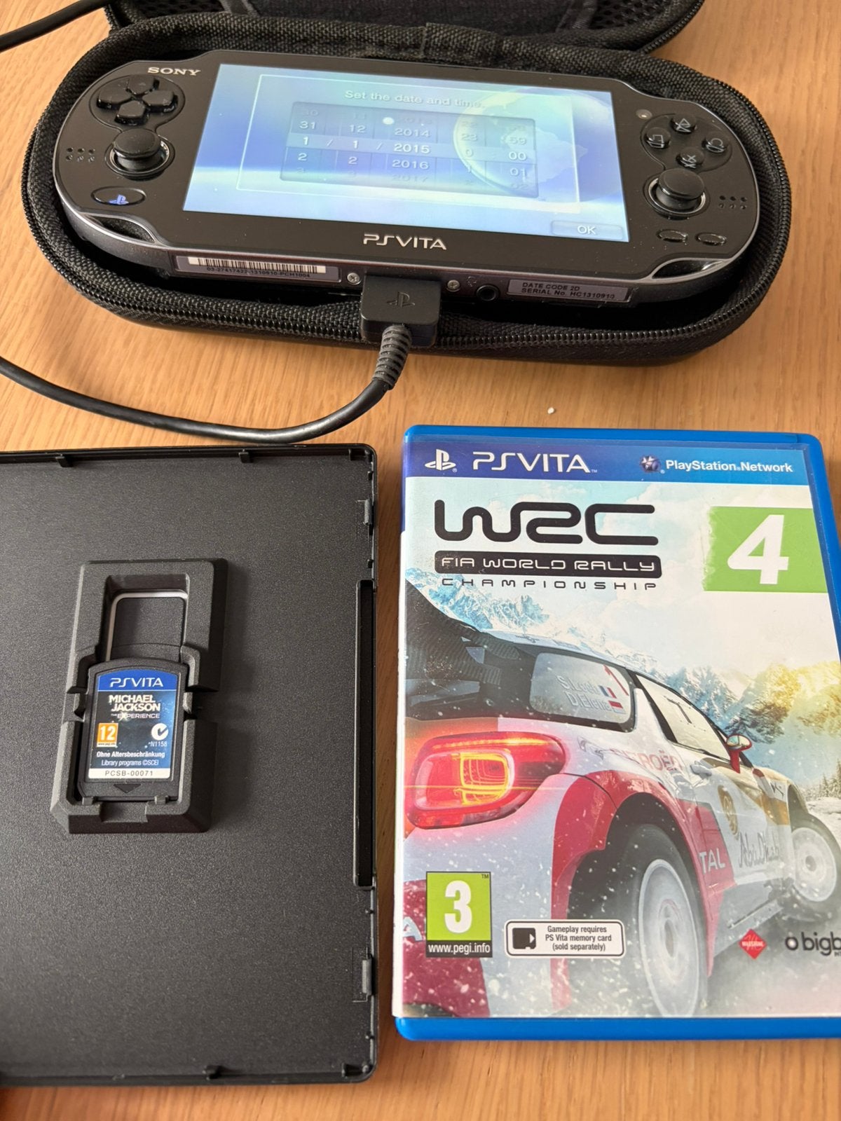 PS Vita (8GB memory card) + 2 games (zie foto’s), Ophalen of Verzenden, Gebruikt, Zwart, Met games