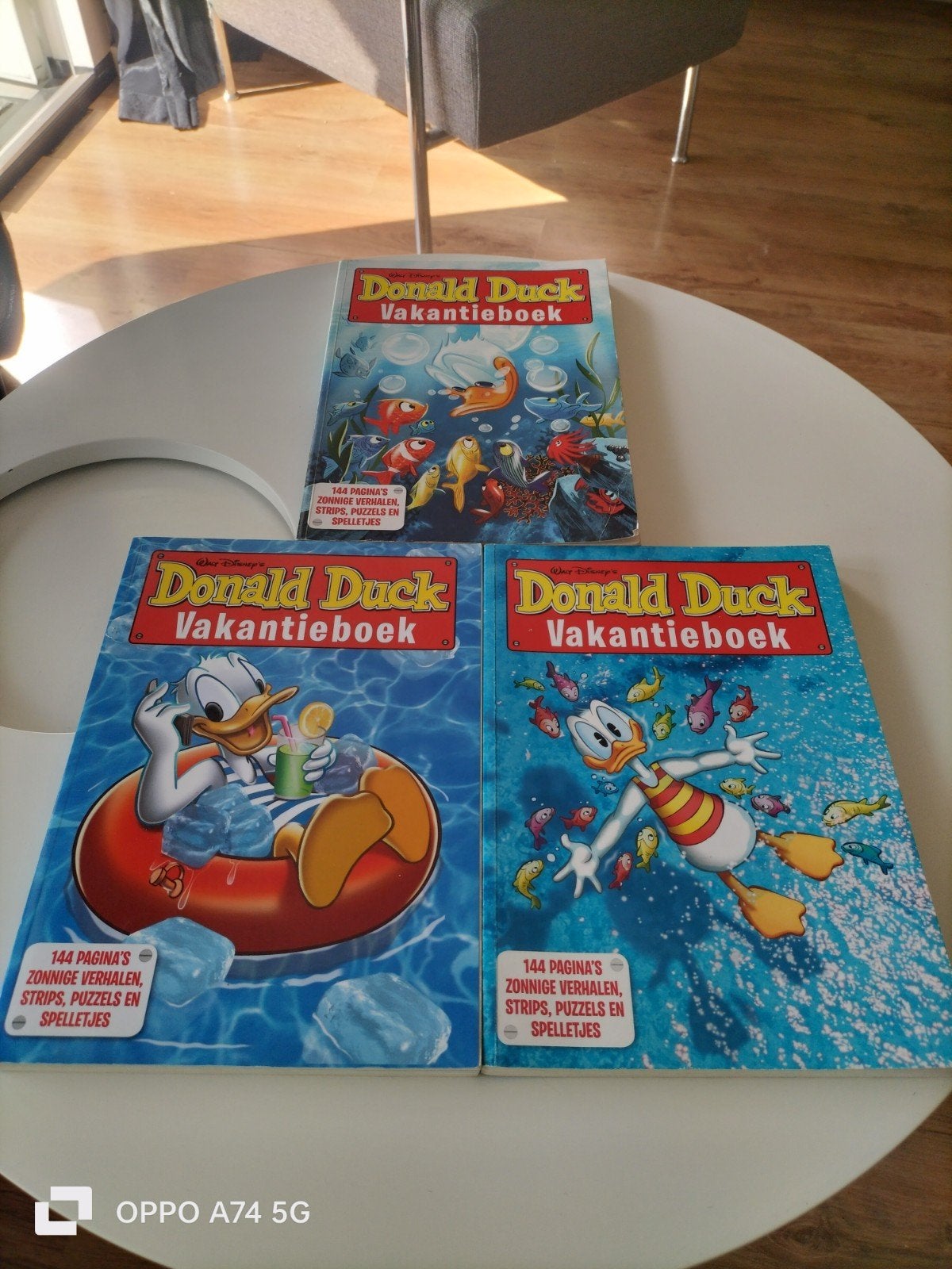 3 Donald Duck Vakantieboeken - Zonnige Verhalen en Puzzels, Meerdere stripboeken, Ophalen of Verzenden, Gelezen