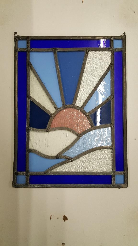 Glas in lood - ondergaande zon, Ophalen