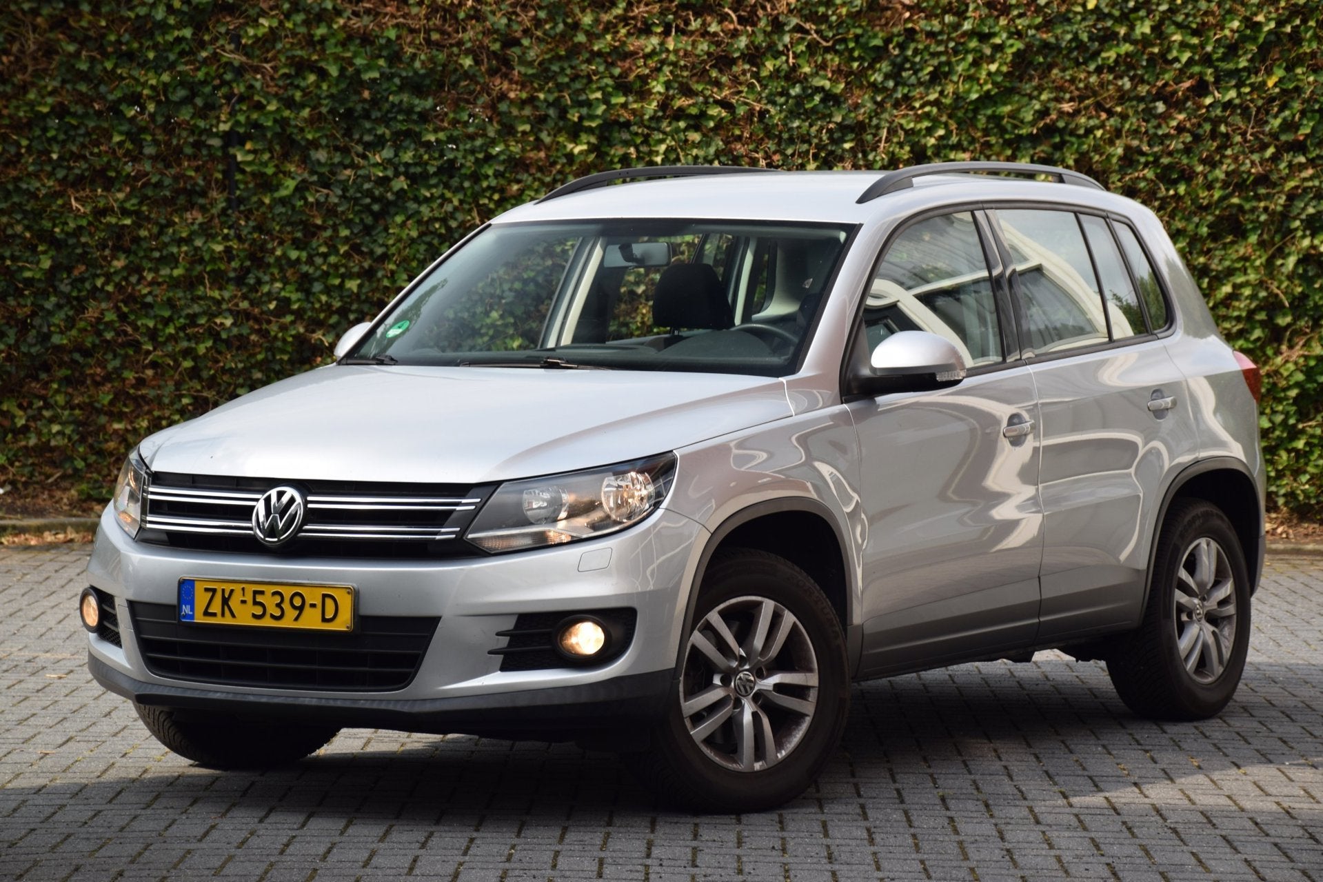 Volkswagen Tiguan 1.4 TSI Trend & Fun Clima/Cruise/Stoelverw, Auto's, Voorwielaandrijving, Euro 5, Gebruikt, Zwart