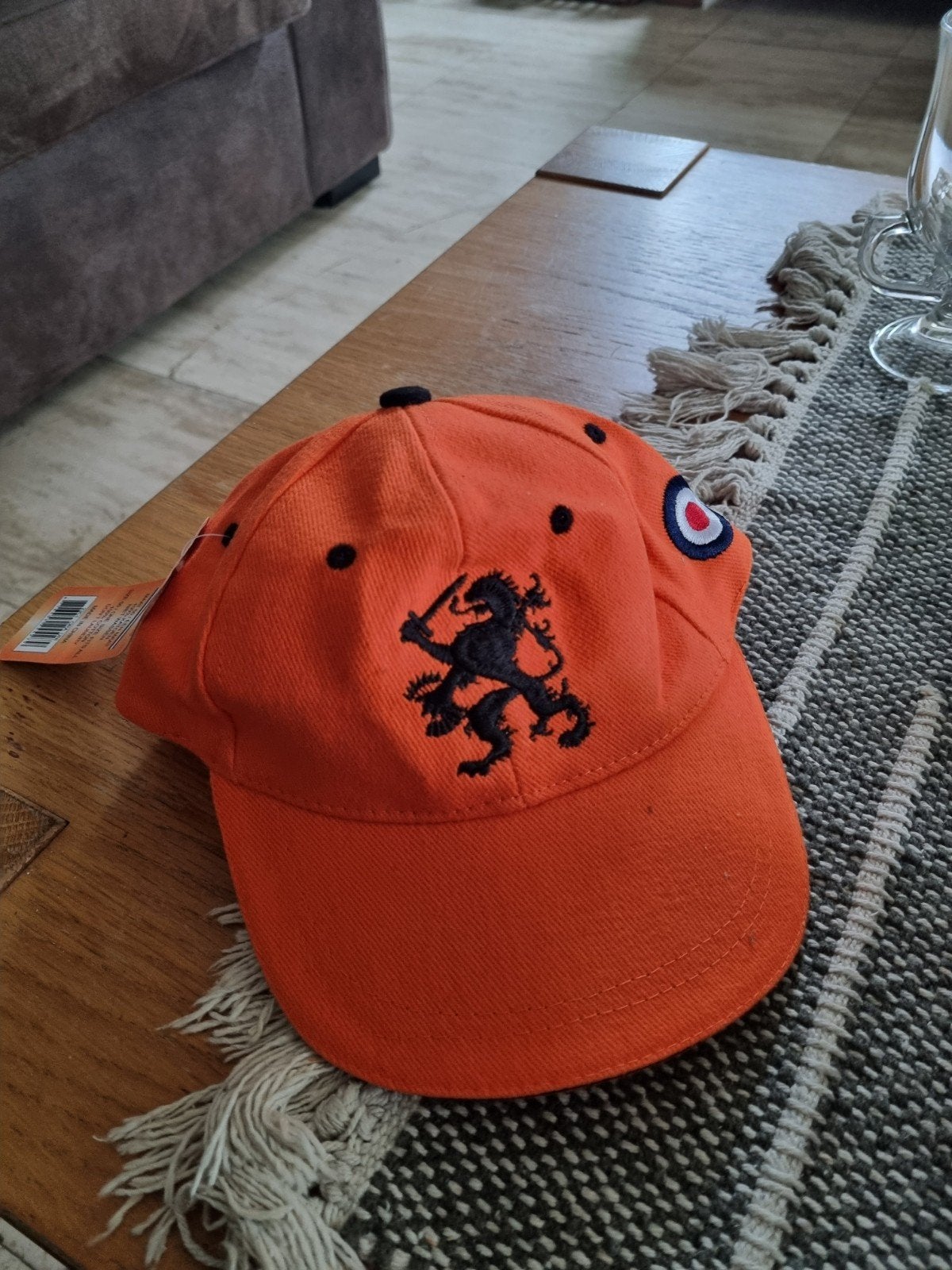 Oranje kinderpet met Nederlandse leeuw, Kinderen en Baby's, Babykleding | Petten en Hoeden, Ophalen, Zo goed als nieuw, Jongetje of Meisje