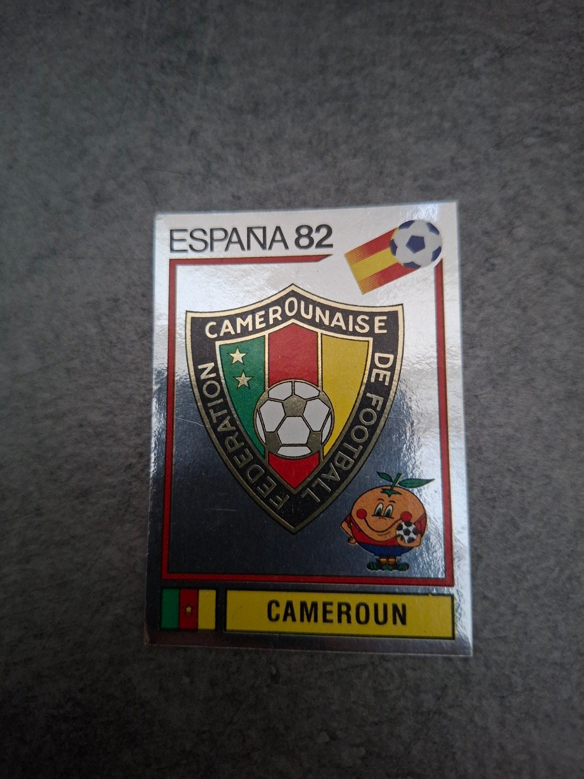 Panini sticker WK 82 Espana. Embleem Kameroen., Verzenden, Zo goed als nieuw, Sticker