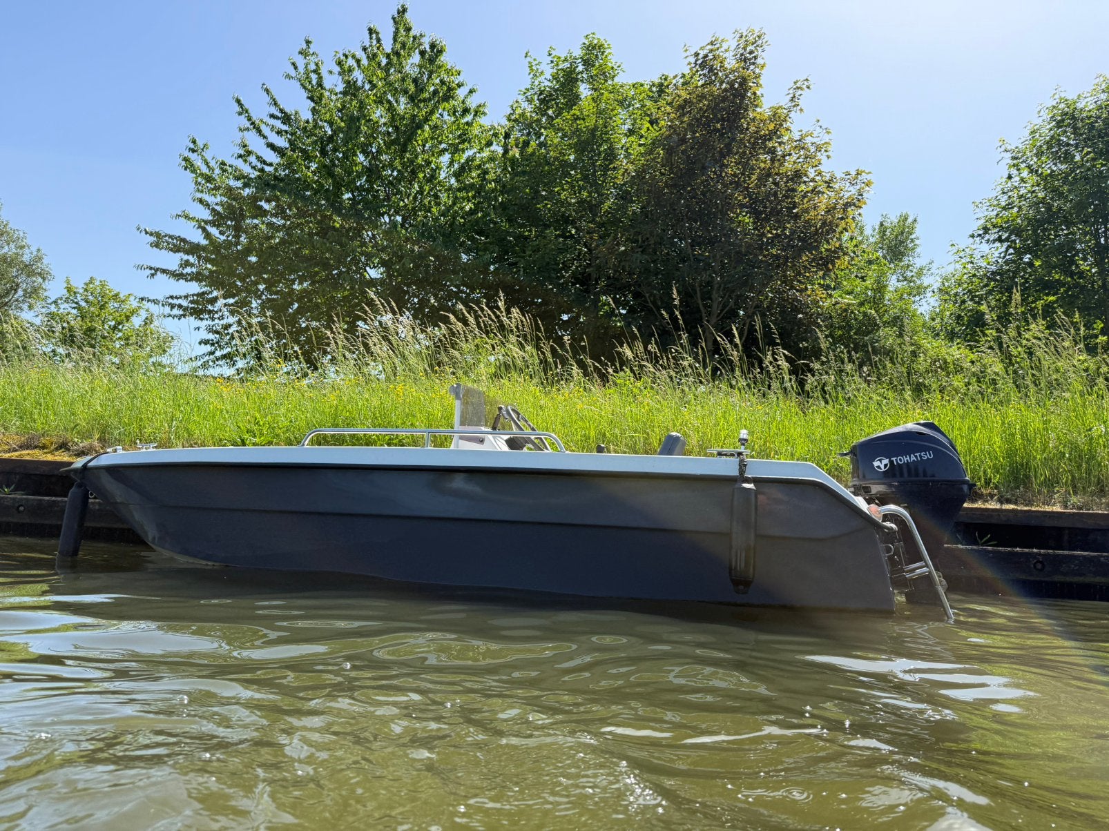 Consoleboot + Tohatsu 9.8 PK + Trailer, Ophalen, Buitenboordmotor, Trailer, Zo goed als nieuw