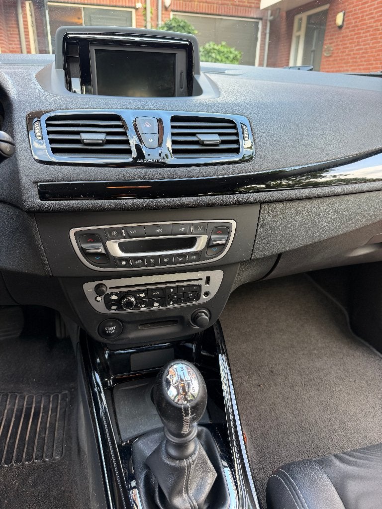 Foto 19 van Renault Mégane 1.5 DCI 81KW Estate 2012 met winterbanden