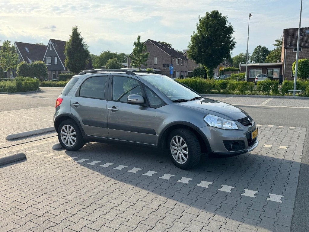 Suzuki SX4 1.6 Exclusive | 2013 | 120.000 km, Auto's, Stof, 4 cilinders, 49 €/maand, Origineel Nederlands