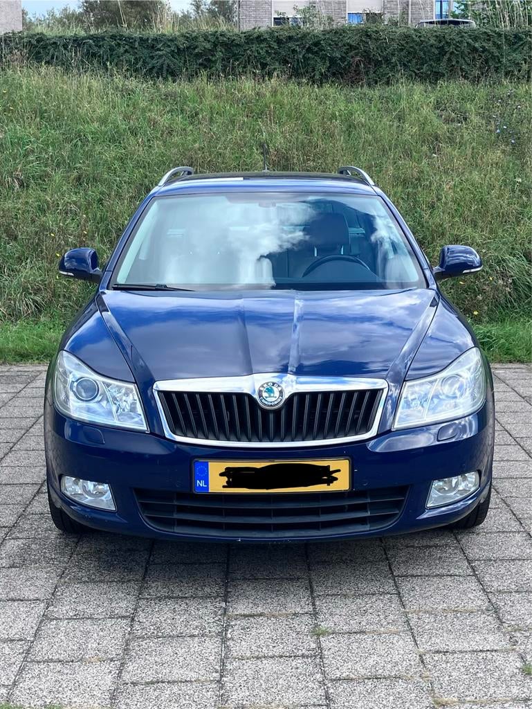 Skoda Octavia 1.6 TDI 77KW Combi Greentech 2012 Blauw, Auto's, Skoda, Voorwielaandrijving, Beige, 4 cilinders, Blauw