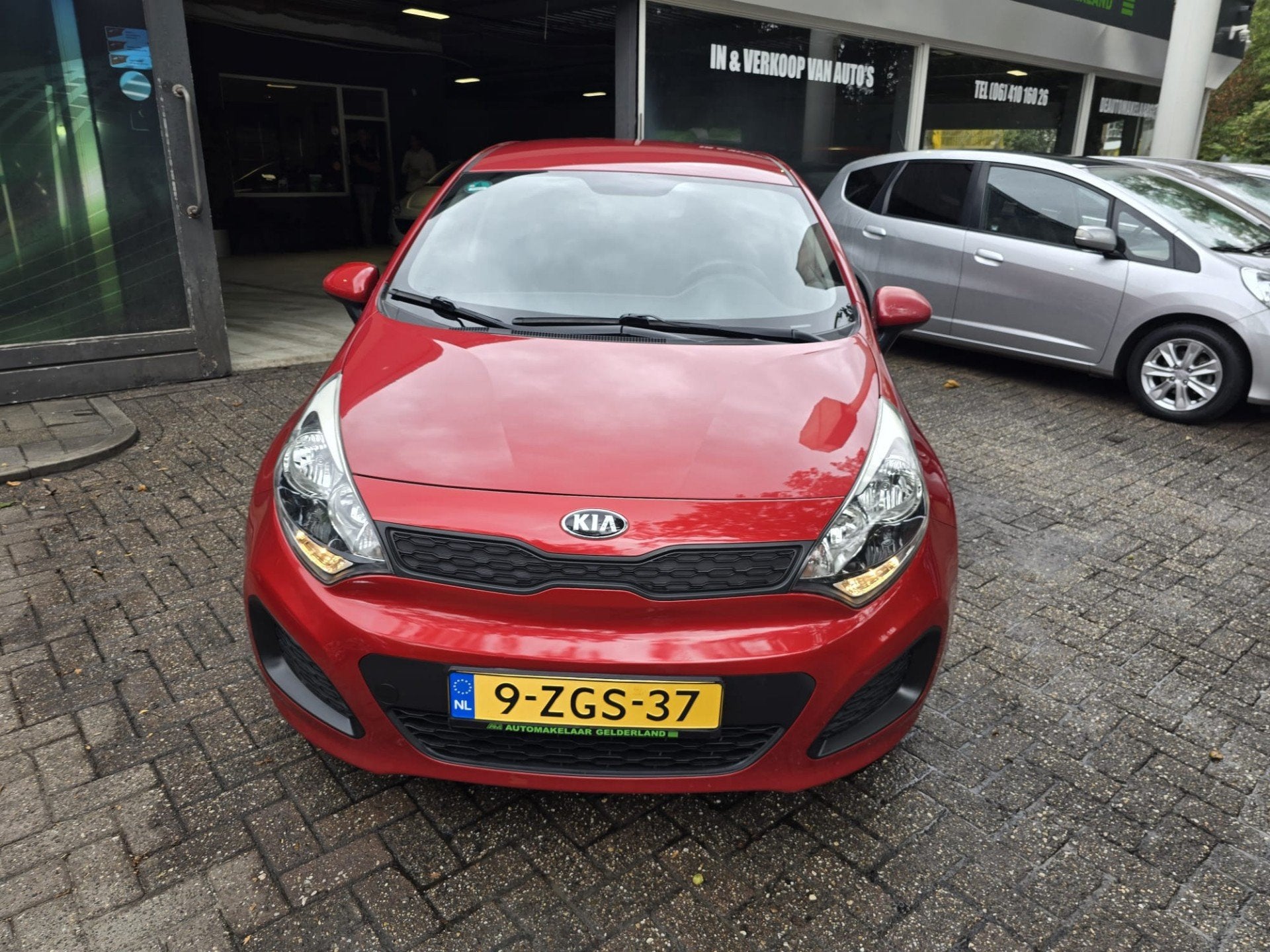 Kia Rio 1.2 CVVT ComfortLine | 1E EIGENAAR | 3/6 OF 12 MND G, 4 cilinders, Origineel Nederlands, Handgeschakeld, Grijs