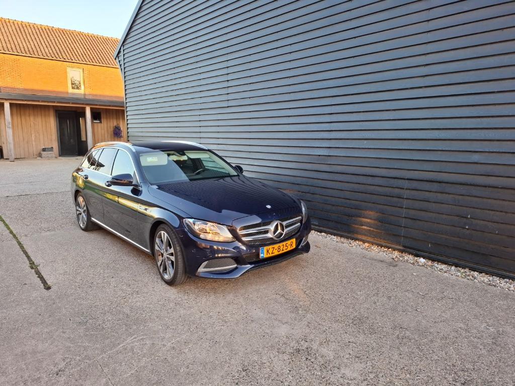 Mercedes-Benz C-Klasse C180 1.6 115KW Aut7 Estate 2015 Blauw, Auto's, Automaat, Achterwielaandrijving, 74 €/maand, Zwart