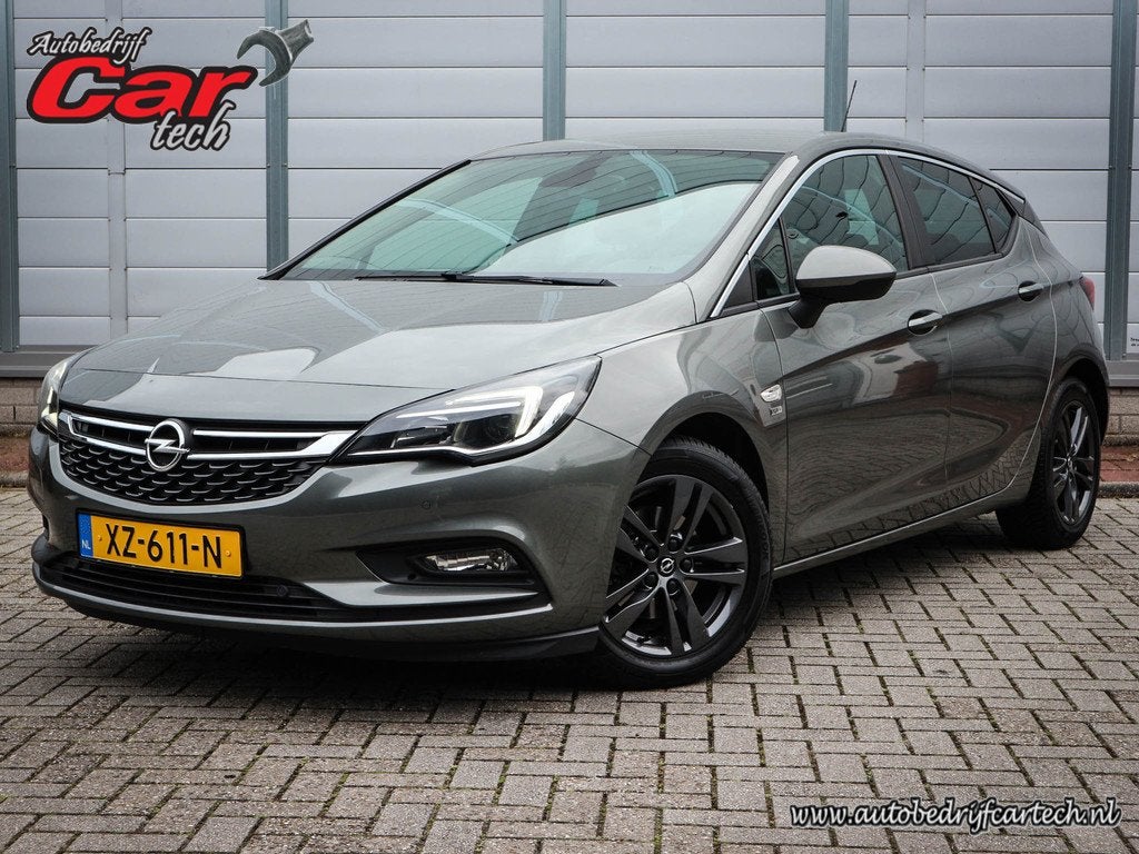 Opel Astra 1.0 Turbo 120 Jaar Edition | Clima | Cruise | Nav, Auto's, Opel, Bedrijf, Te koop, Astra, ABS, Airbags, Airconditioning