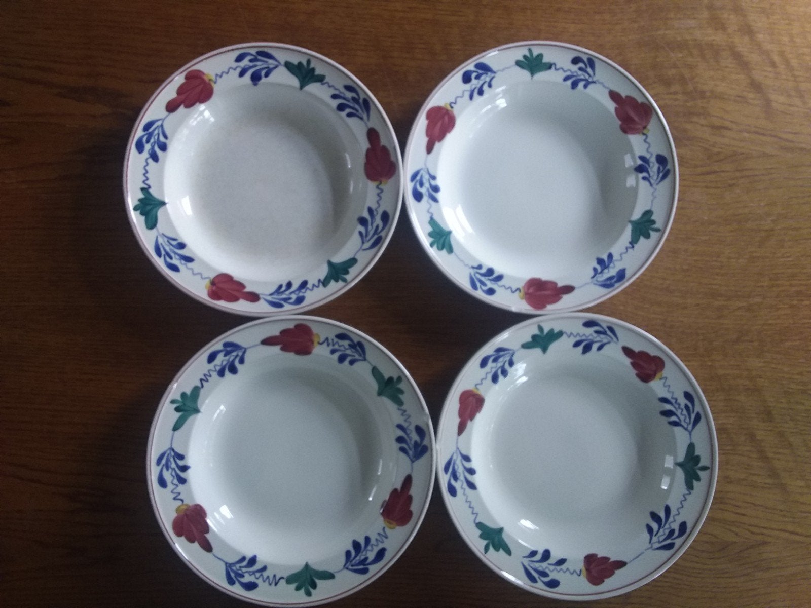 4 diepe Boerenbont borden van Petrus Regout, Ophalen
