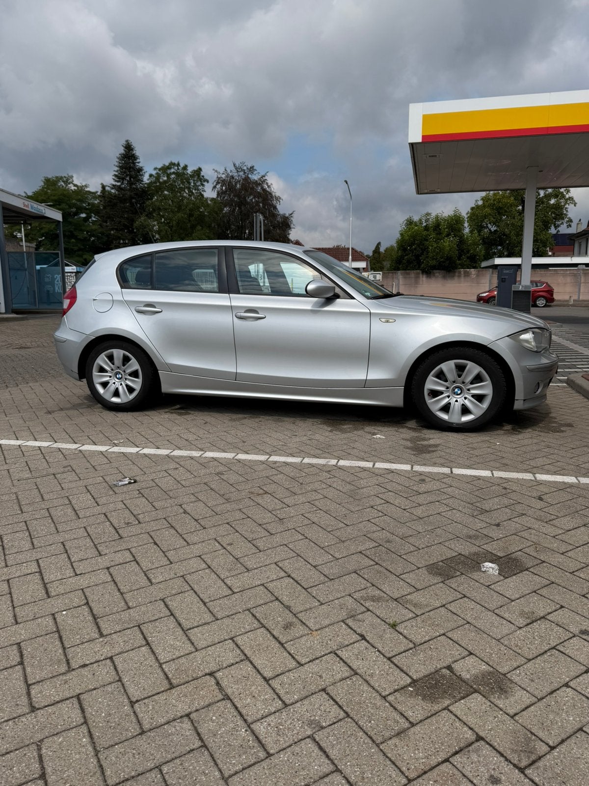 BMW 1-Serie 2.0 118I AUT 2007 Grijs, Auto's, BMW, Achterwielaandrijving, 1995 cc, Zwart, 4 cilinders
