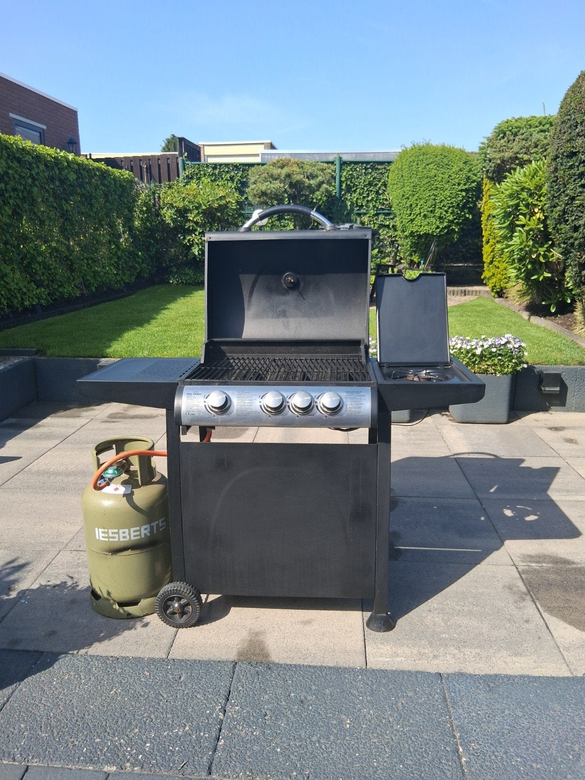 Gasbarbecue met 4 branders en zijbrander, Ophalen of Verzenden, Gebruikt, Nice Cooker