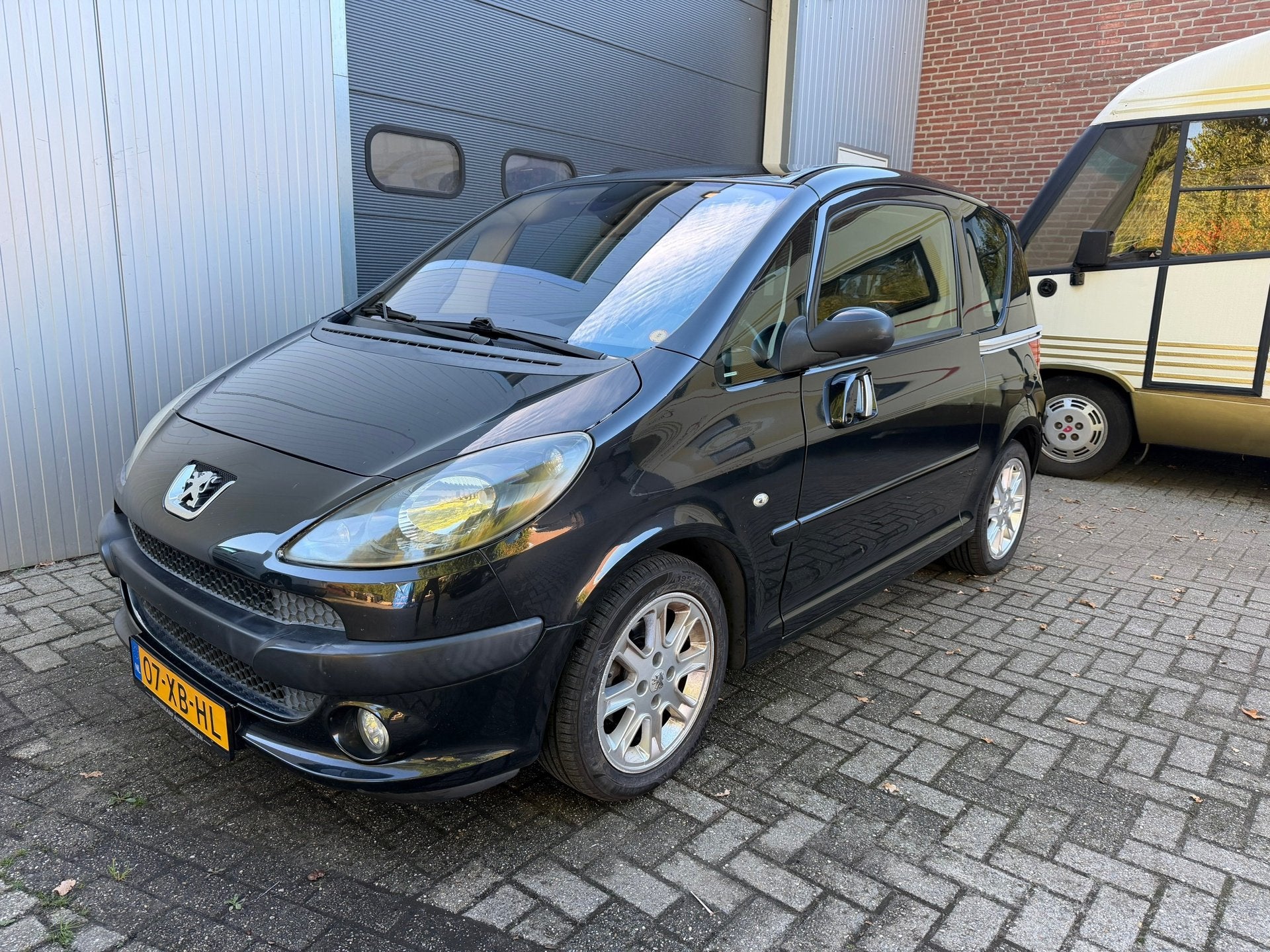 Peugeot 1007 1.4-16V Sesam Sporty, Auto's, Voorwielaandrijving, 4 cilinders, 610 kg, Origineel Nederlands
