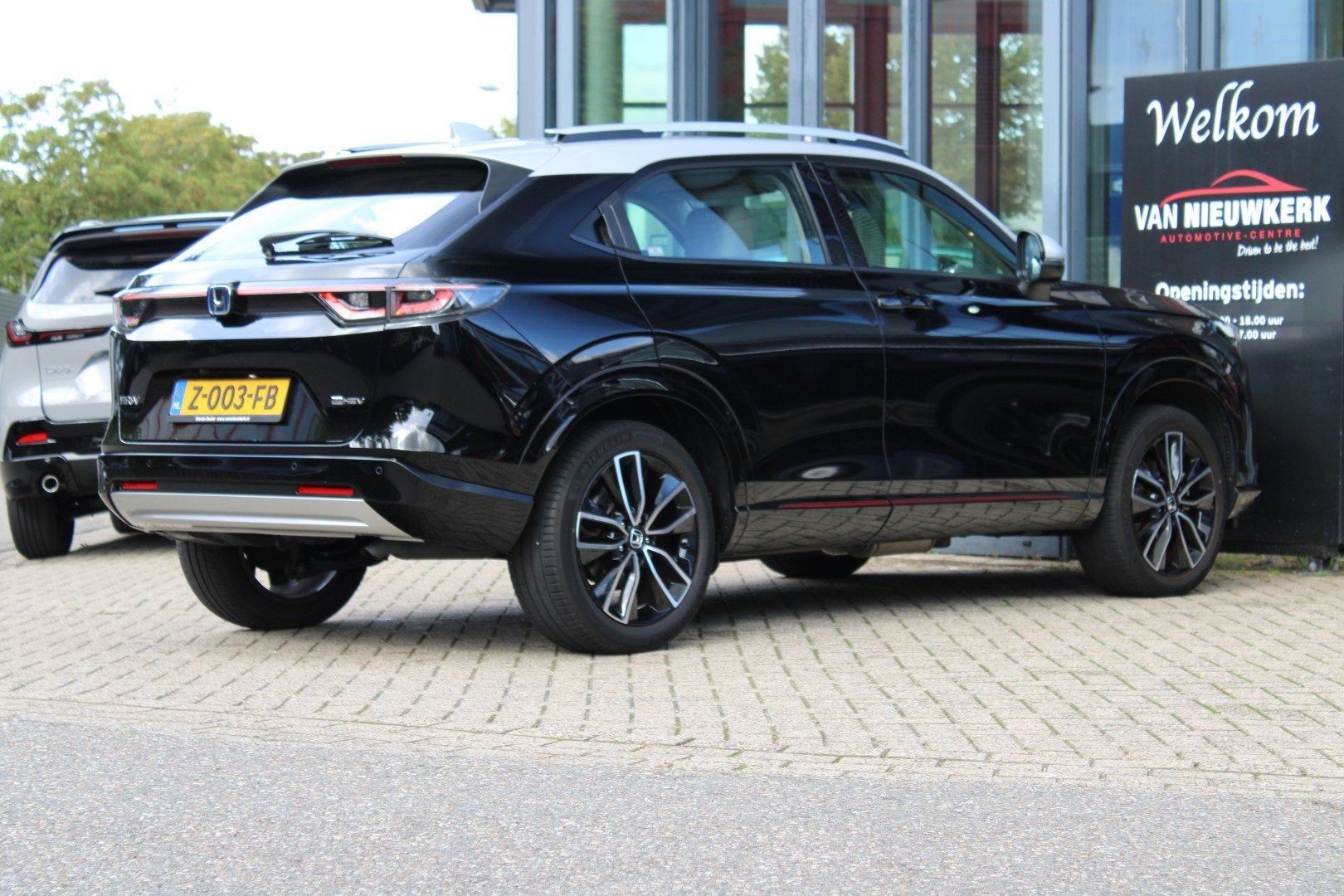 Honda HR-V 1.5 i-MMD 131pk CVT Advance Style | Keyless | Sto, Auto's, Lichtsensor, Leder en Stof, Zwart, Origineel Nederlands