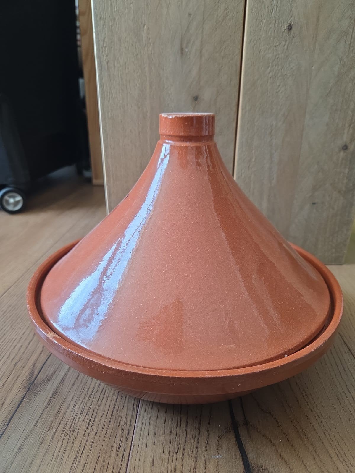 Bruine Tajine, Ophalen