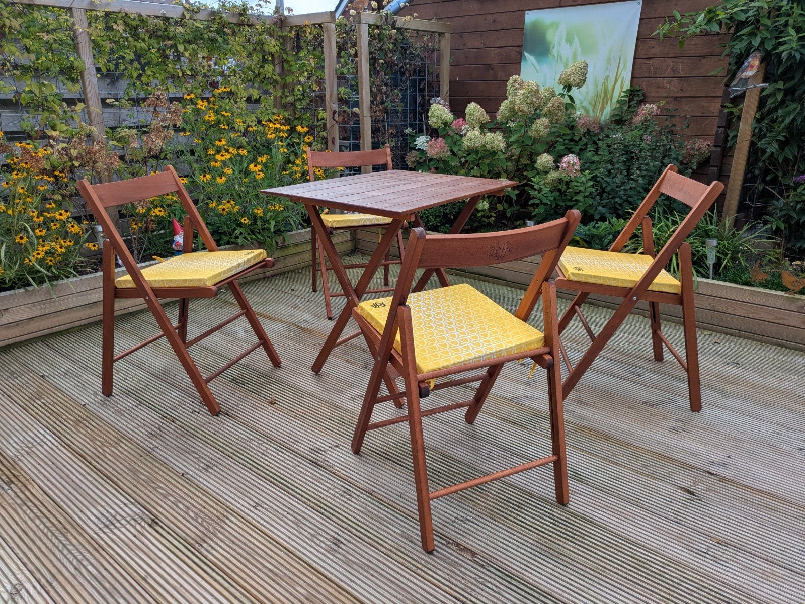 Leffe Bistro Tuinset: Tafel met 4 stoelen en kussens, 4 zitplaatsen, Gebruikt, Ophalen of Verzenden, Tuinset