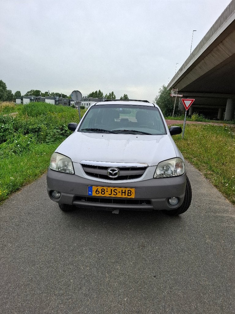 Mazda Tribute 2.0 Exclusive 4WD 2002 Wit, Auto's, Mazda, 745 kg, Stof, 1989 cc, 4 cilinders
