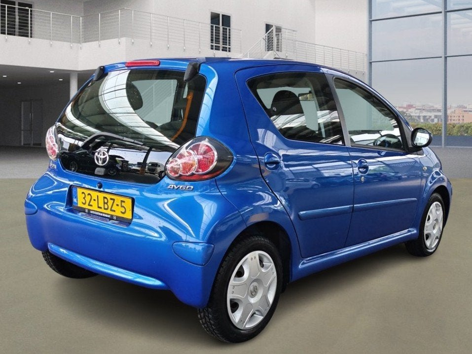 Toyota Aygo 1.0-12V Dynamic Blue Airco +NAP NL-auto, Auto's, Toyota, Stof, 68 pk, Origineel Nederlands, Bedrijf