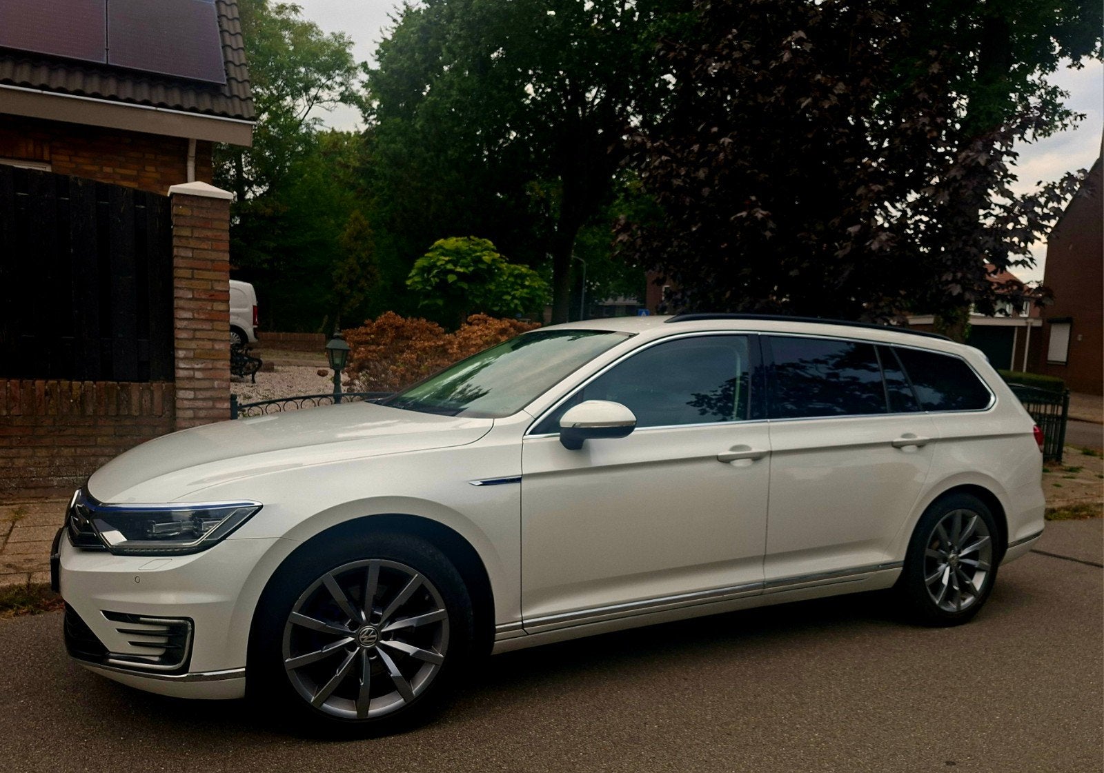 Volkswagen Passat 1.4 TSI PHEV 218pk, Auto's, Navigatiesysteem, Wit, 1600 kg, Blauw