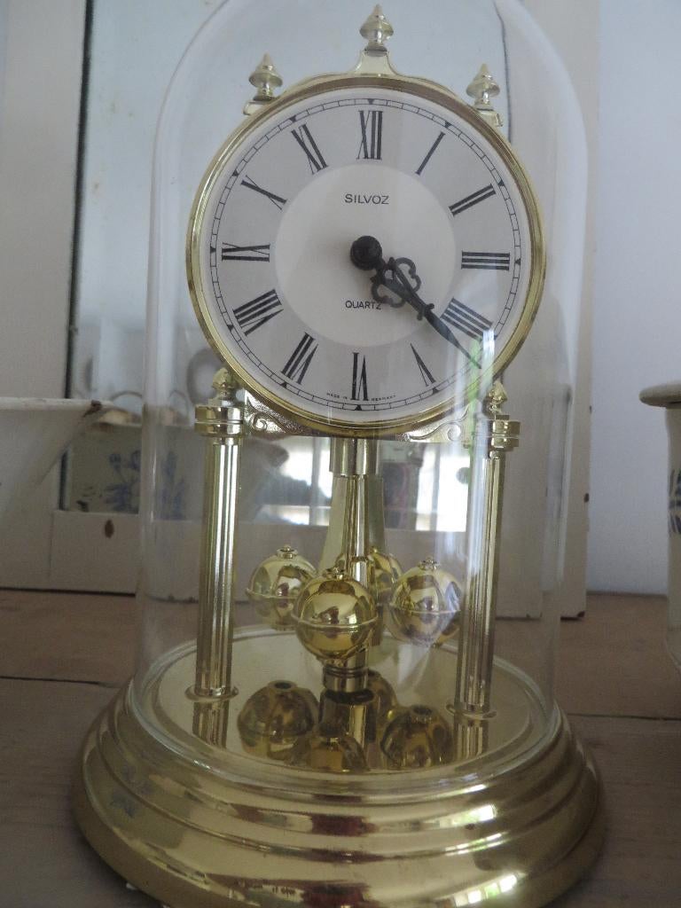 Silvoz Quartz "anniversary clock", Antiek en Kunst, Antiek | Klokken, Ophalen of Verzenden