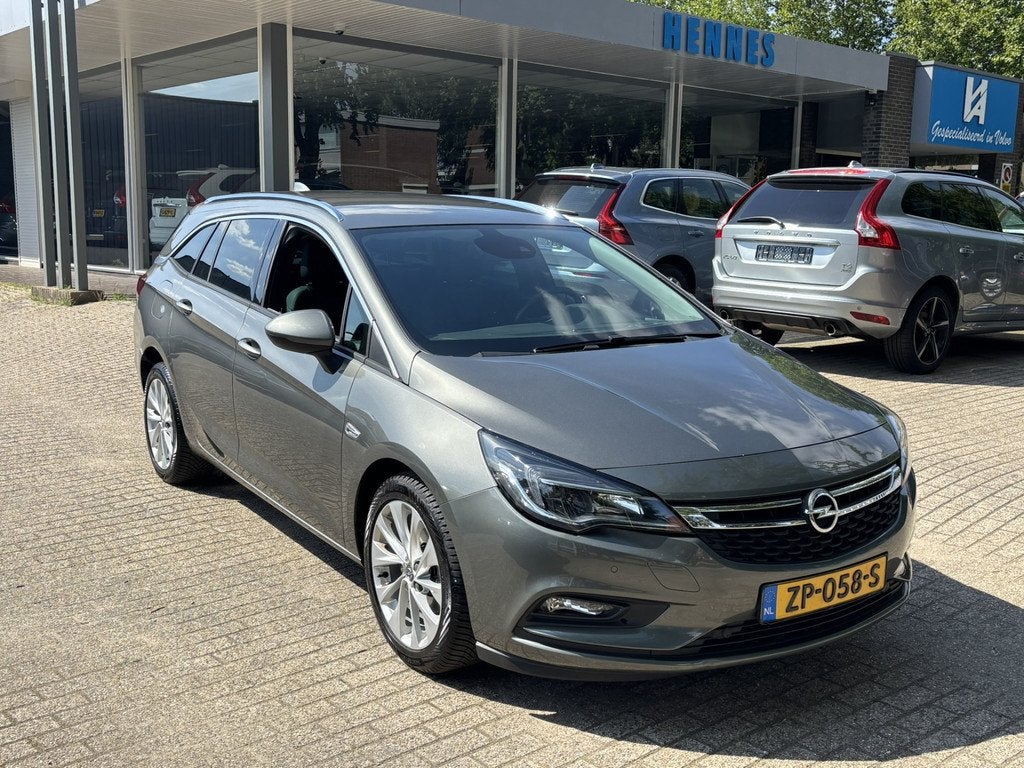 Opel Astra Sports Tourer 1.4 Innovation Leder Keyless stoel+, Auto's, Opel, Bedrijf, Te koop, Astra, ABS, Achteruitrijcamera, Airbags
