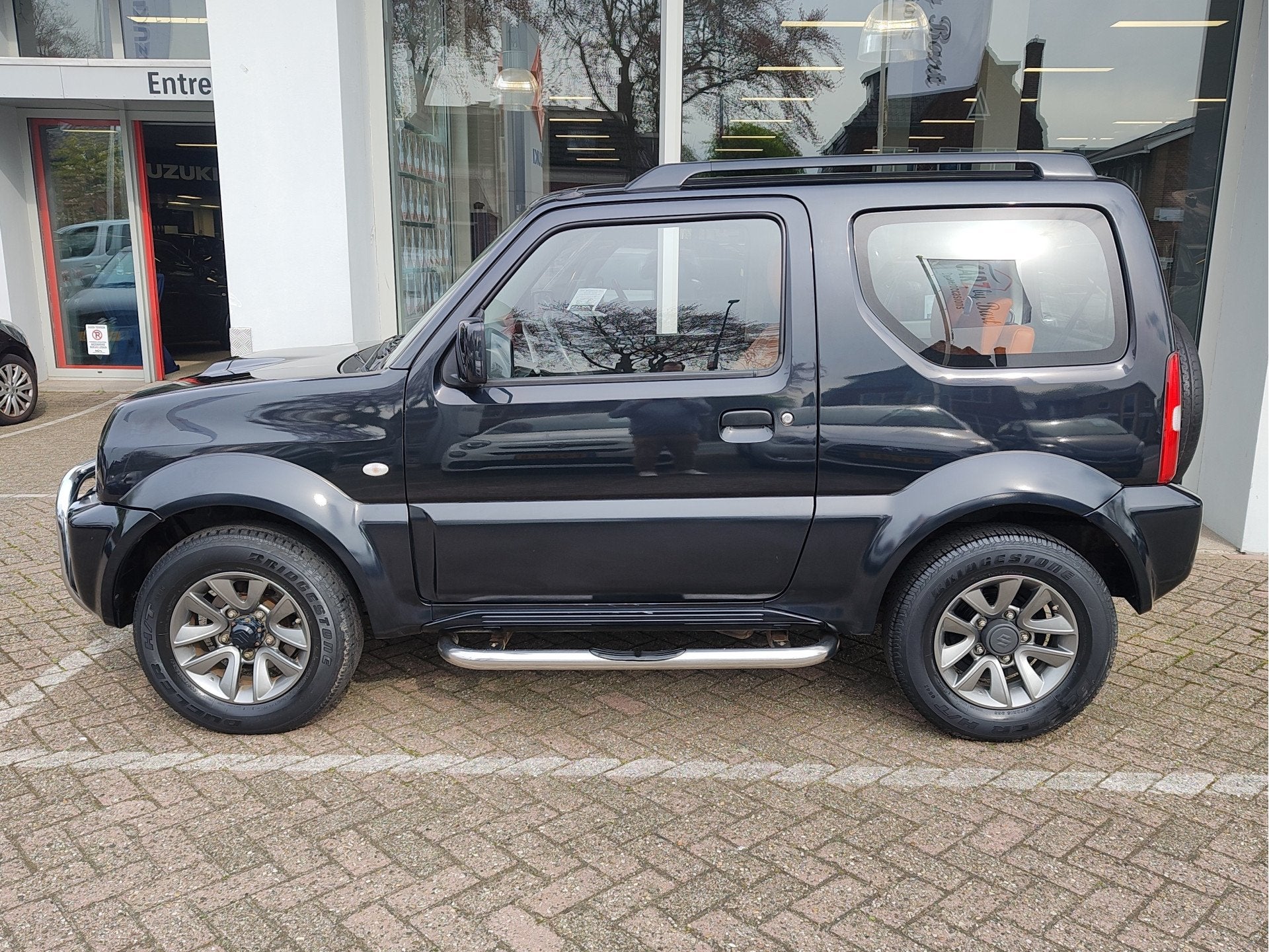 Suzuki Jimny 1.3 EXCLUSIVE AUTOMAAT Cognac leder | Airco | 4, Auto's, Suzuki, Automaat, 12 maanden, 86 pk, Gebruikt