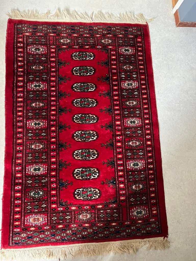 Een origineel Perzisch tafel loper, Ophalen
