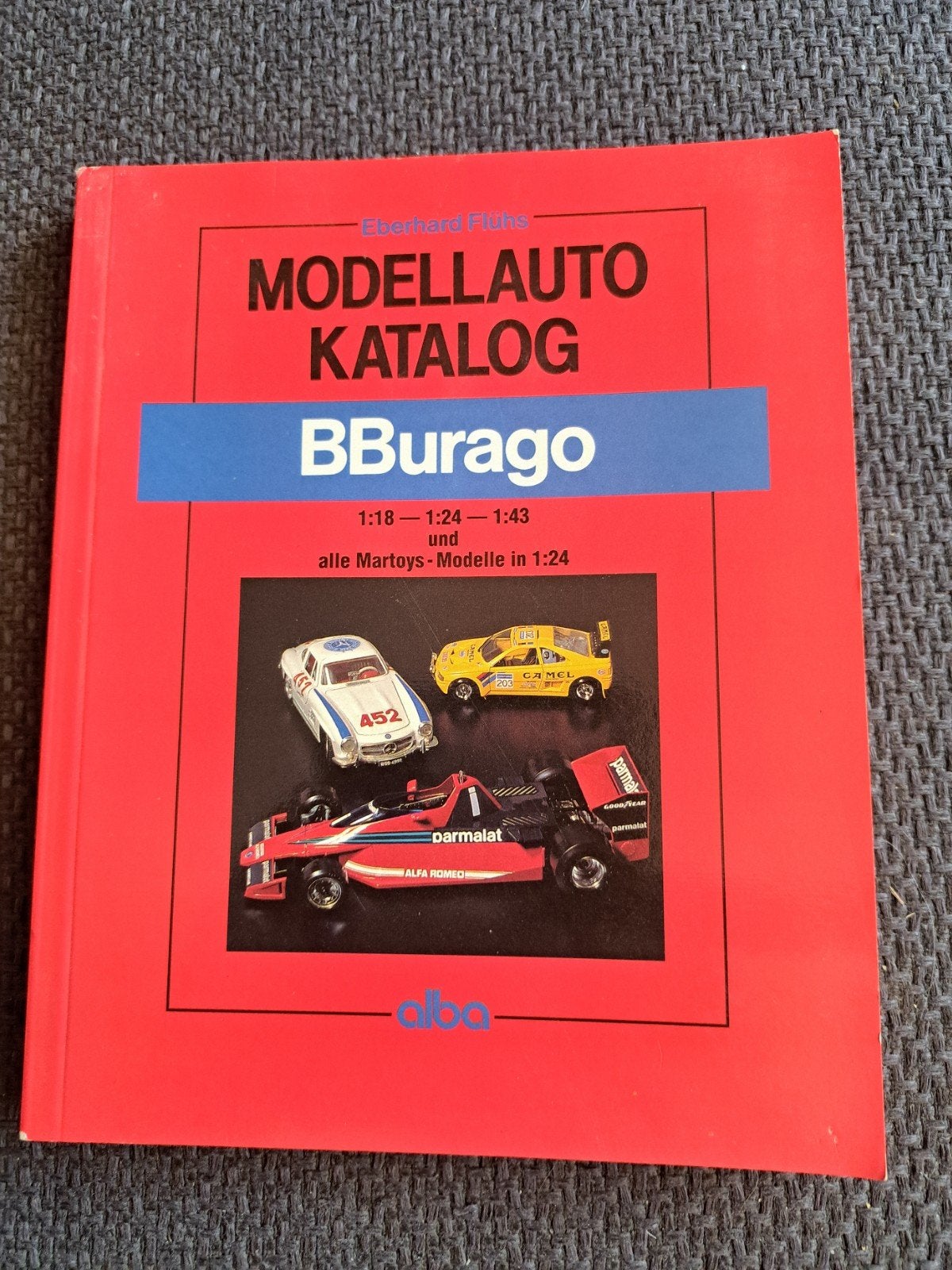 Modellauto katalog bburago, Boeken, Gelezen, Eberhard fluhs, Ophalen of Verzenden, Catalogus