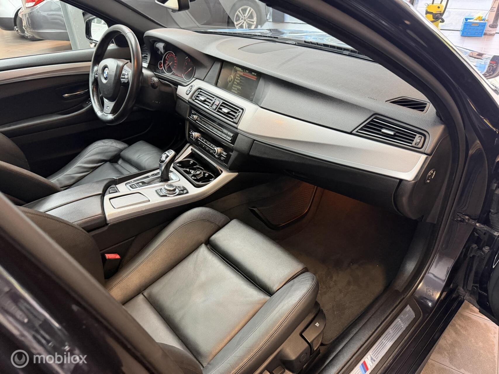 Foto 16 van BMW 5-serie Touring 520i High Executive