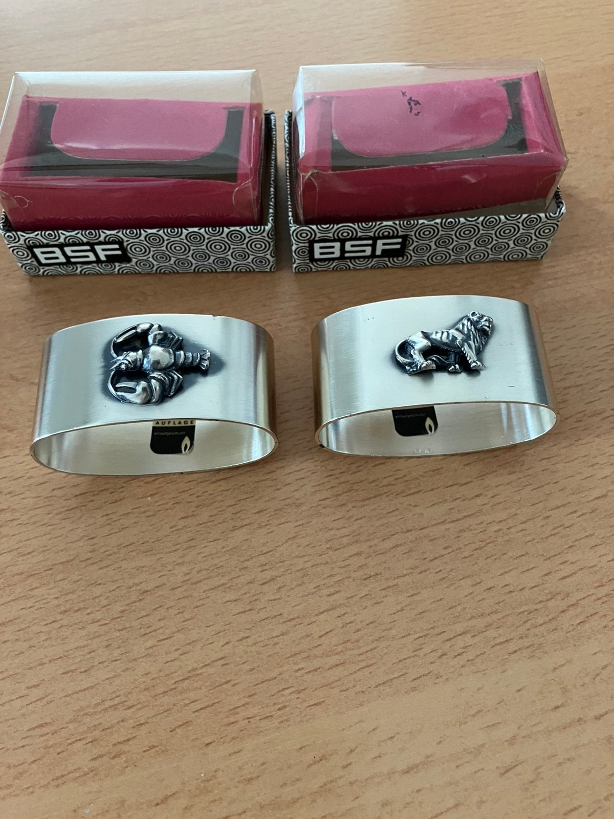 Nieuw 2 servetringen leeuw en kreeft 7,50 per stuk,, Ophalen of Verzenden, Zo goed als nieuw, Glas, Overige stijlen