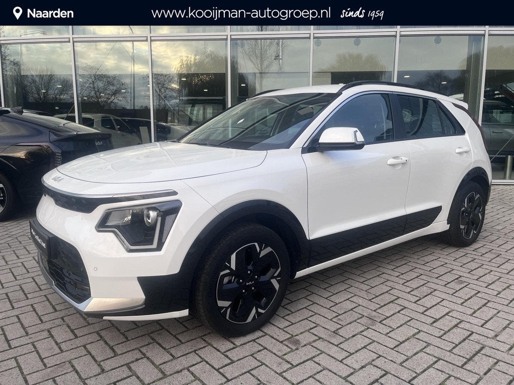 Kia Niro EV DynamicLine 64.8 kWh Nav|Lmv|camera, Auto's, Gebruikt, 750 kg, 1657 kg, Leder en Stof