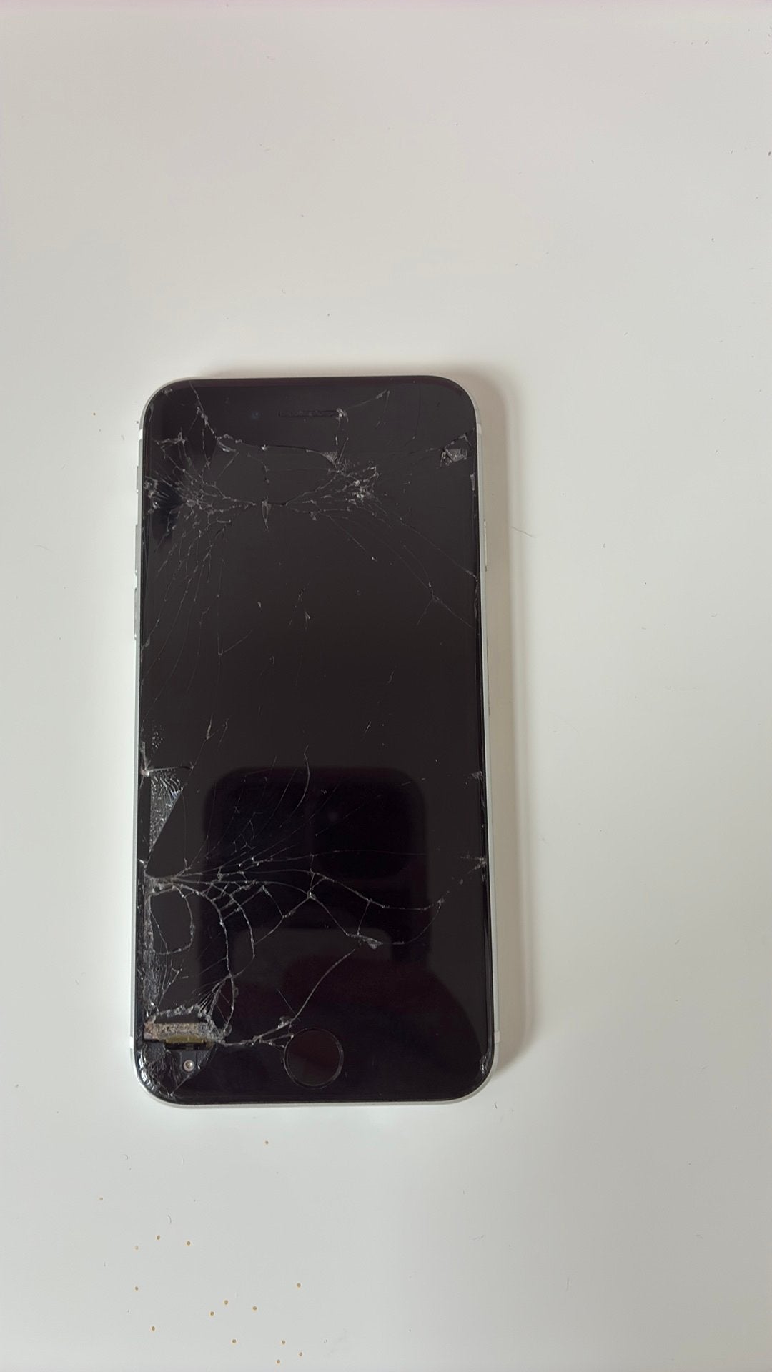 Te koop: een witte iPhone SE (2020) met 64 GB opslag., Telecommunicatie, Mobiele telefoons | Apple iPhone, Gebruikt, Wit, Ophalen of Verzenden