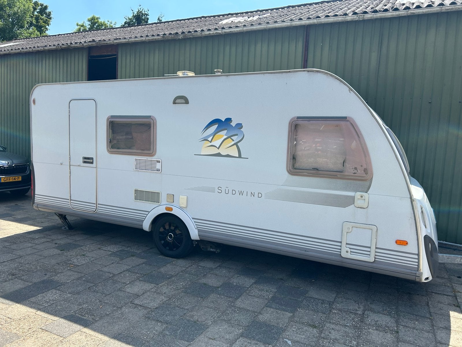 Knaus Sudwind 550 FDK met stapelbed en voortent, Caravans en Kamperen, Caravans, Stapelbed, Treinzit, Particulier, 5 tot 6 meter
