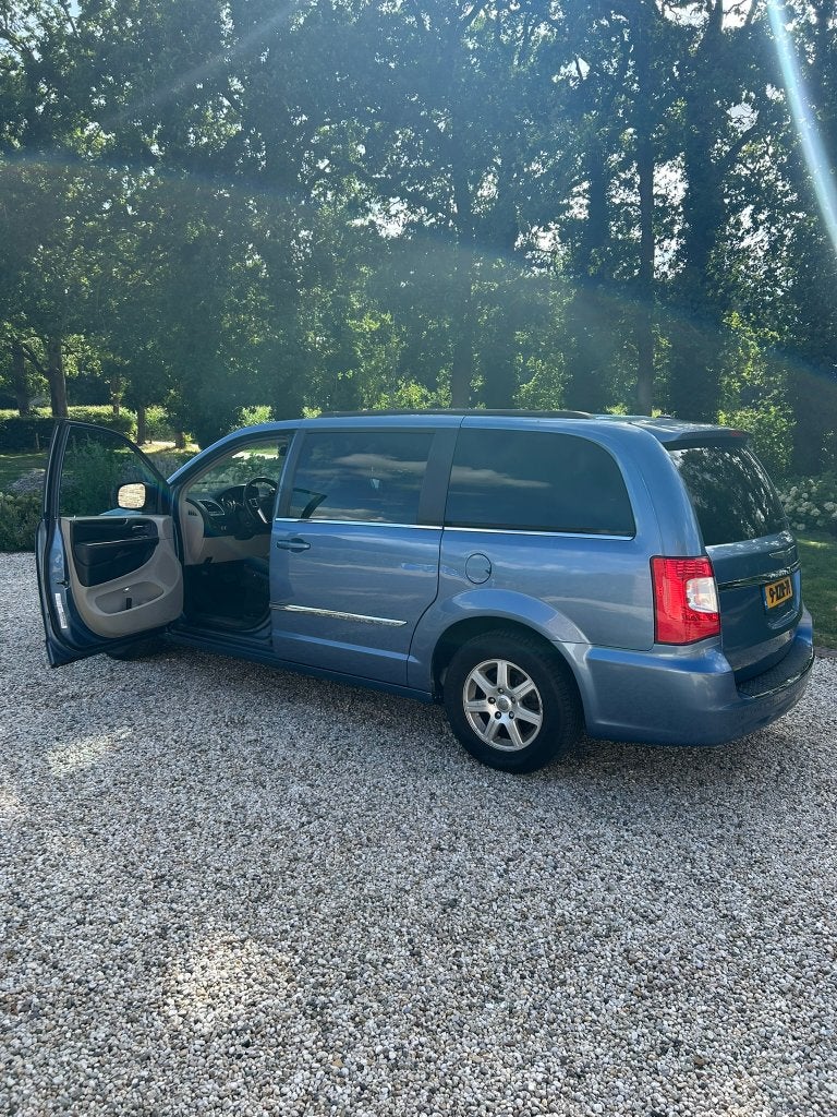 Te koop: Chrysler Voyager uit 2011. Blauw. 7 Persoons., Auto's, Chrysler, Euro 5, 450 kg, Zwart, Grand Voyager