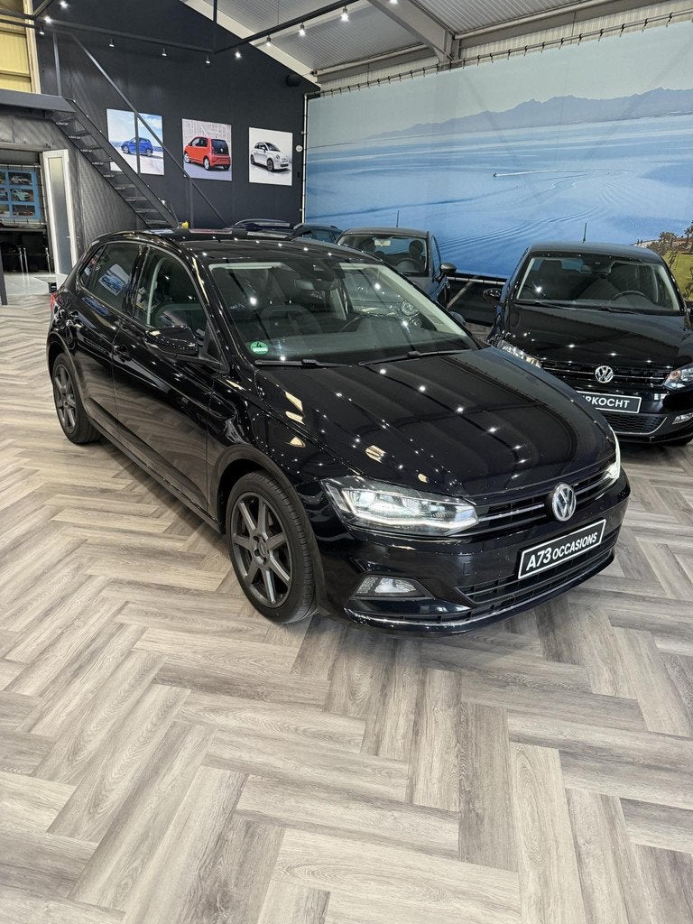 Volkswagen Polo 1.0 TSI Highline LED,NAVI,PDC,STARTKNOP, Voorwielaandrijving, Gebruikt, 95 pk, Zwart