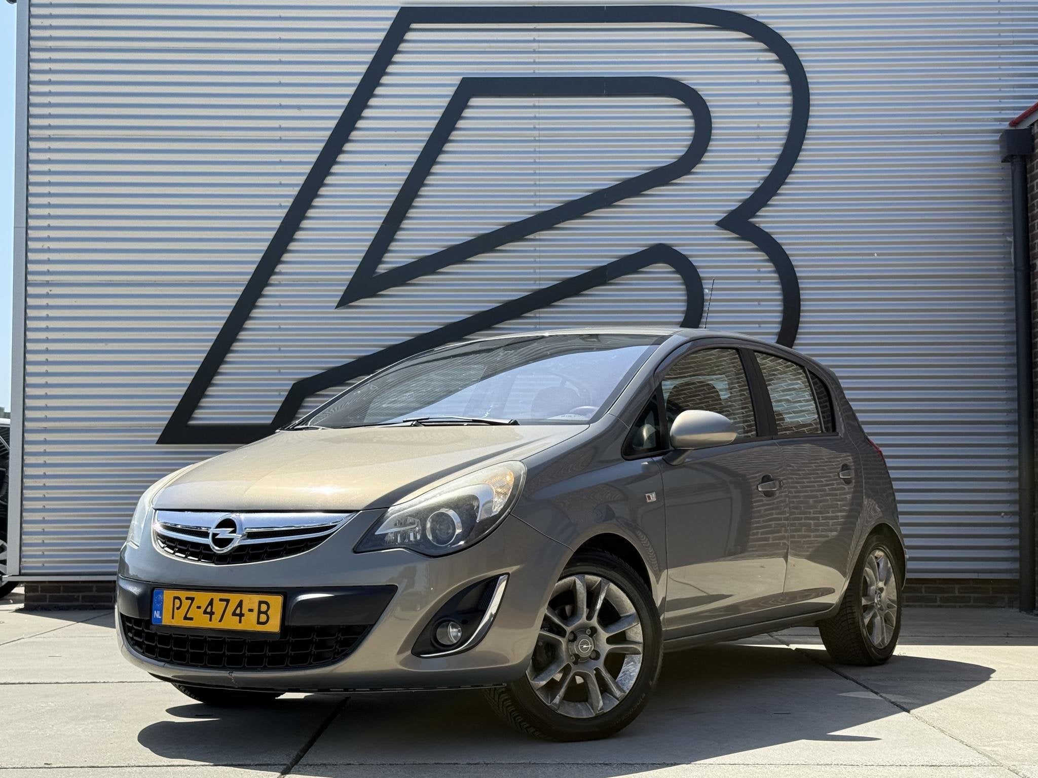 Opel Corsa 1.2-16V Cosmo Navi|Clima|Cruise|PDC|Elek ramen|Go, Auto's, Voorwielaandrijving, Euro 5, Gebruikt, 4 cilinders