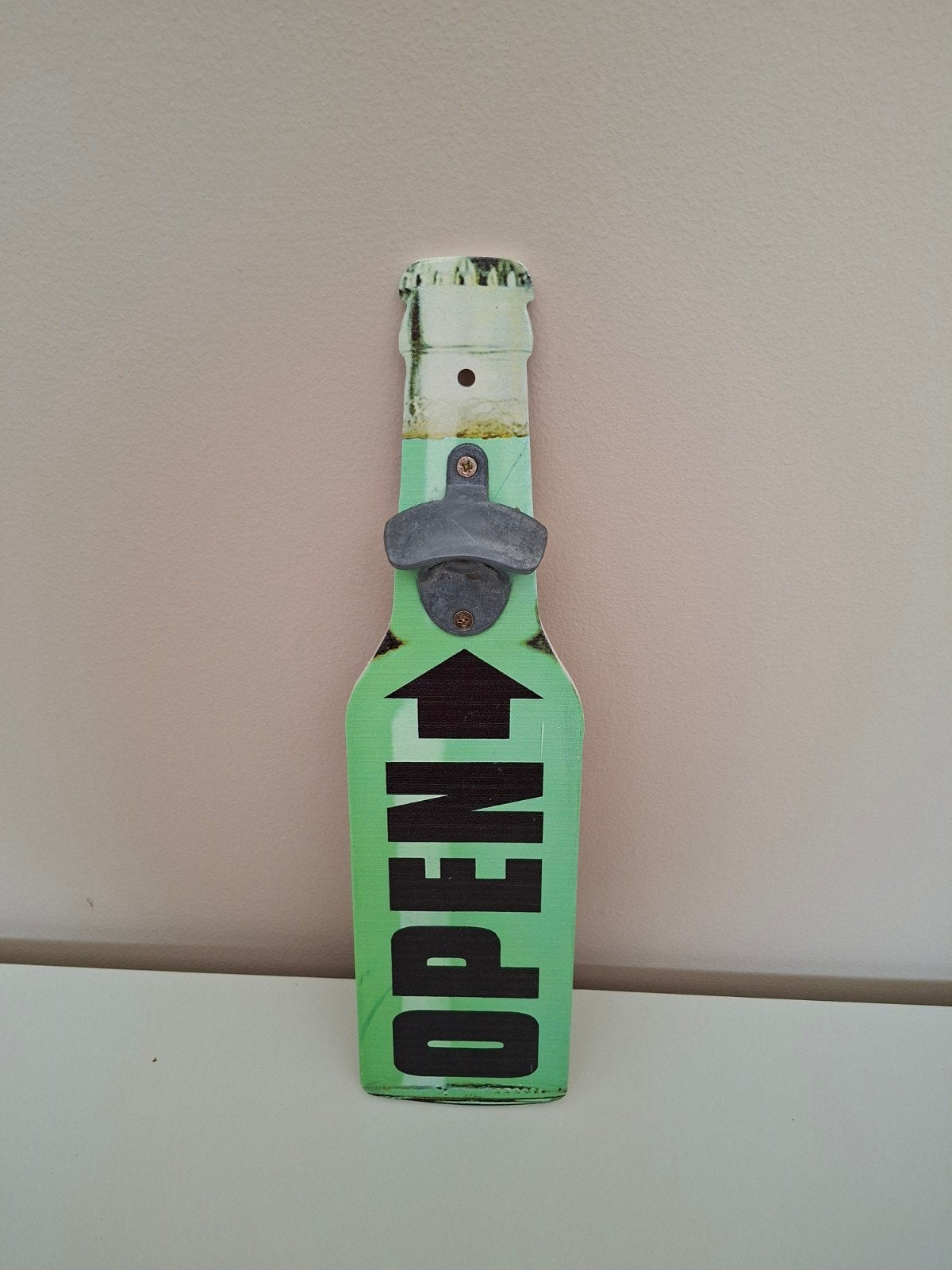 Bierdoppen opener decoratie, Ophalen