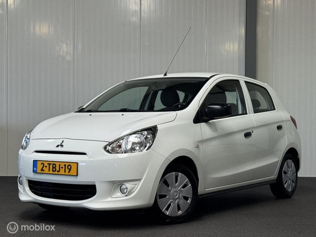 Mitsubishi Space Star 1.0 5-drs Inform [ NAP airco isofix ], Auto's, Voorwielaandrijving, Euro 5, Stof, Zwart
