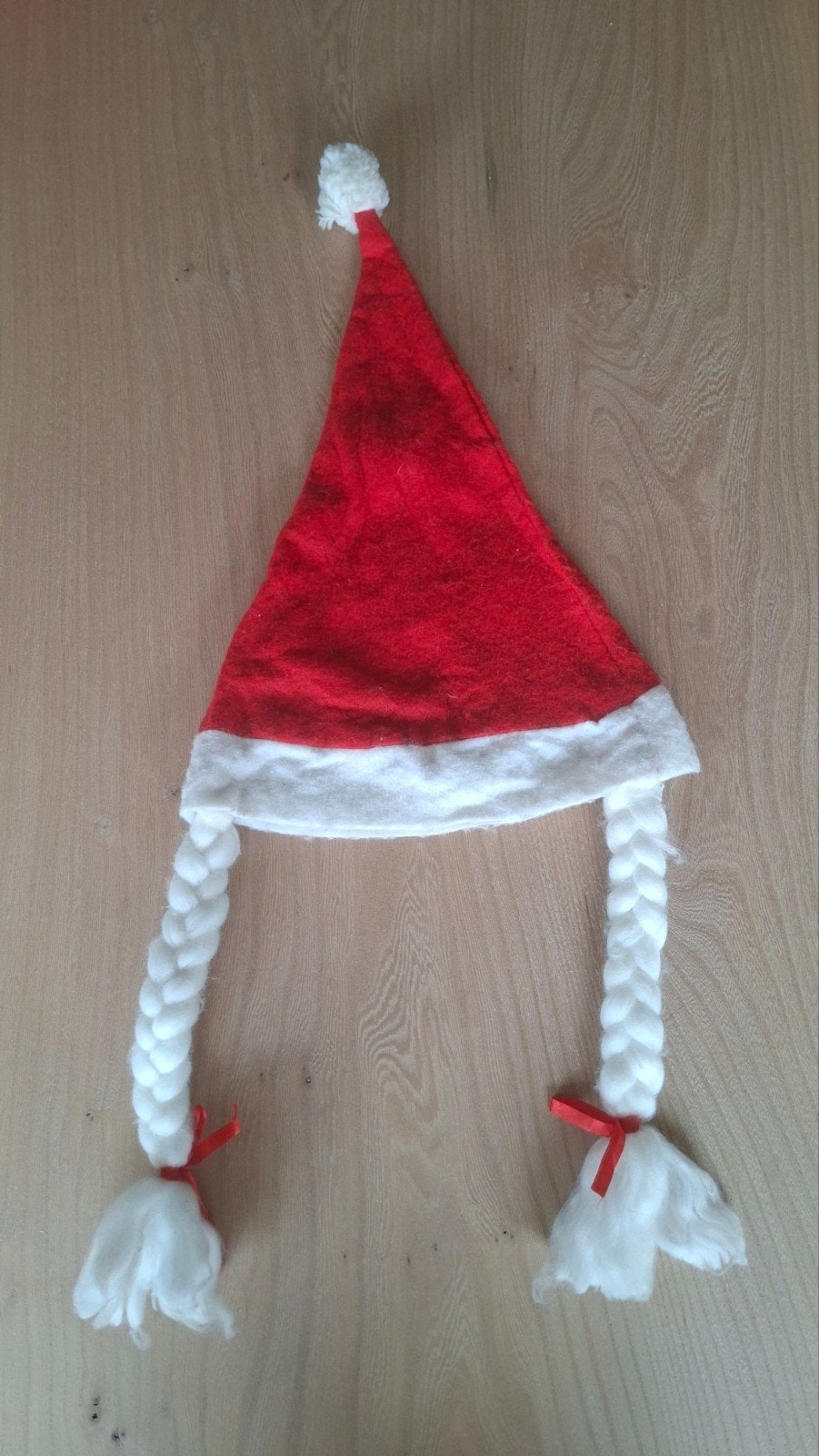 Kerstmuts met vlechtjes, Ophalen, Gebruikt